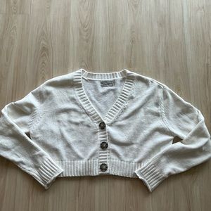 Off-white, cropped button-up sweater from UO. Size small. Good condition